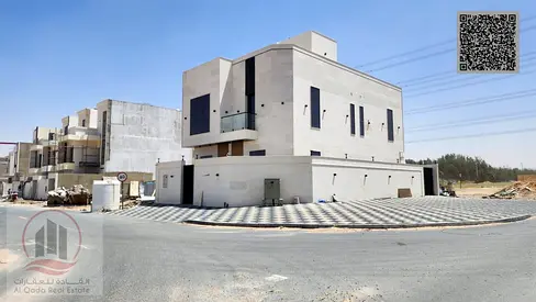 Villa for sale in Ajman, Al Helio area, including registration. Ground floor, first floor, and roof. 5 master bedrooms, majlis, living room, and maid'