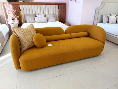 Curved mustard lounge sofa