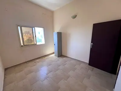 For annual rent in Al Nuaimiya 3 Ajman, a one bedroom apartment with living room located on Sheikh Khalifa Bin Zayed Street near Safeer Mall and Grand