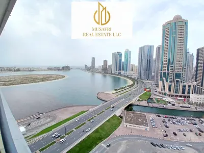 CHILLER AC FREE//HUGE 2BHK APARTMENT//WITH WATER VIEW//WITH BALCONY & GYM POOL FREE//FAMILY BUILDING//LIVE LIFE//PRIME LOCATION//EASY EXIT TO DUBAI//