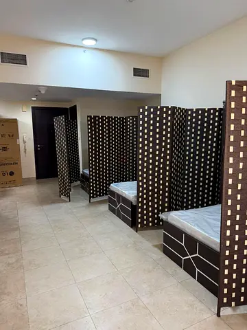 NEXT TO BUS STOP EXECUTIVE BED SPACE IN SILICON OASIS