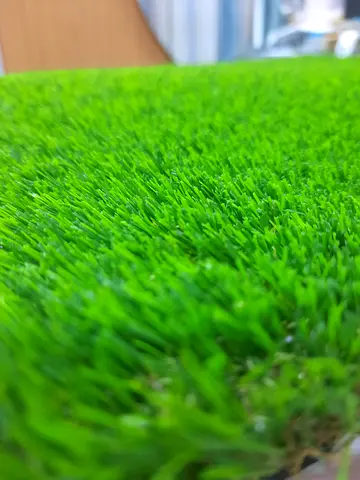 Lightly used artificial grass turf - bright green