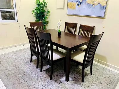 My solid wood 6-seater dining table with 6 chairs