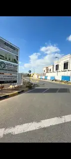 For sale: a prime residential plot of 10,000 sqm in Al Houshi, Al Badiya district.