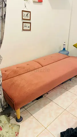 Pink upholstered daybed/bench — used, good condition
