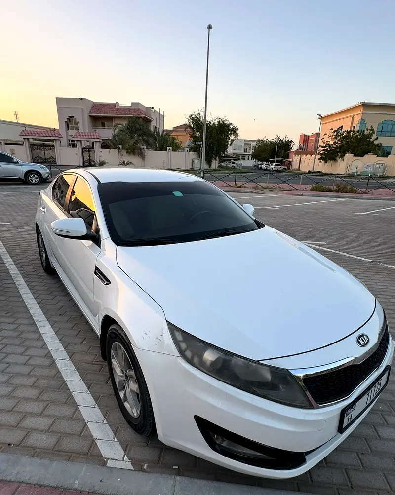 Kia Optima 2014 — photo 1 of 10