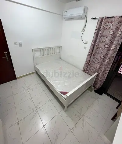 EXECUTIVE INDIAN WORKING COUPLE ROOM WITH BALCONY IN FRONT OF SALAH ALDIN METRO - 2600/- INCLUDING