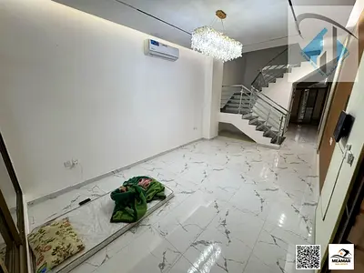 Villa in a prime location for rent, deluxe finishing, spacious areas with a rooftop terrace.