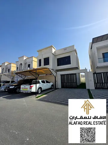 Luxury villa for sale in Al Amerah, Ajman, 5 bedrooms, majlis and hall, 7 bathrooms, premium finishing, prime location, freehold, inclusive price, rea