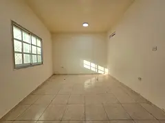 Two-bedroom apartment with a living room for annual rent in Al Nuaimiya, Ajman. Ground floor, separa