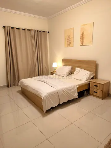 Bedroom set with 2 night stands, chester drawer, 4 door cupboard with sliding door, bed and curtains