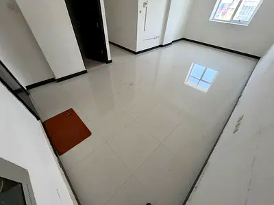 Two-bedroom apartment with a living room, two bathrooms, a large separate hall, central air conditioning, located in the Rawda area near Sheikh Ammar