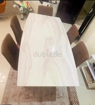 Marble design glass top dining table