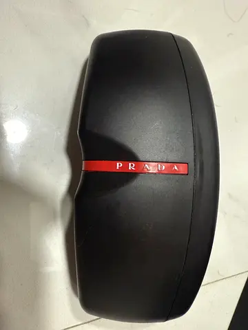 Prada sunglasses hard case — black with red stripe