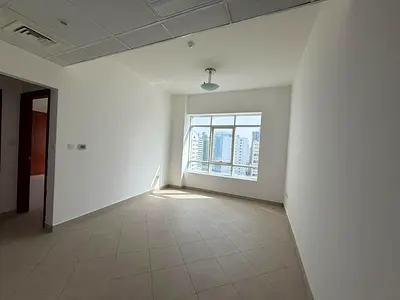 Free parking, 1BR hall, spacious, family tower, open view, flexible, free maintenance, prime location, near Dubai exit