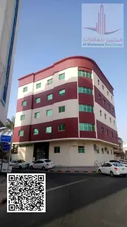 Two-bedroom apartment with a living room and two bathrooms in Al Nuaimiya 2 area, building on the ma