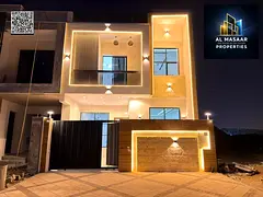Villa for sale in Ajman, two floors and a roof, at a bargain price including fees. Excellent locatio
