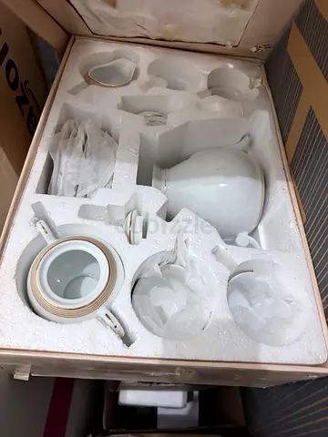 Brand new 19 pieces white porcelain tea set
