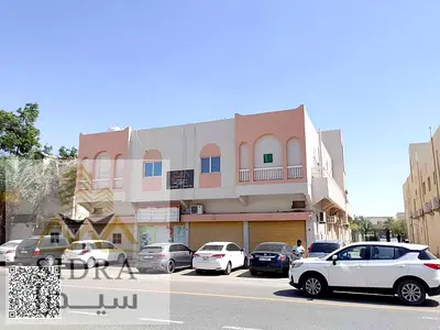 Residential–Commercial Building for Sale in Al Rawda 3 | Prime Corner Location