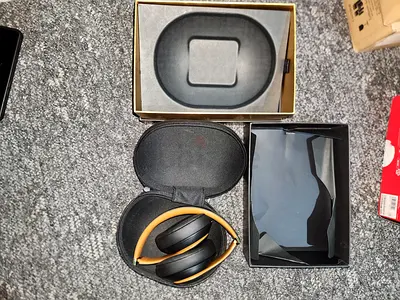 Lightly used over-ear headphones with hard carrying case