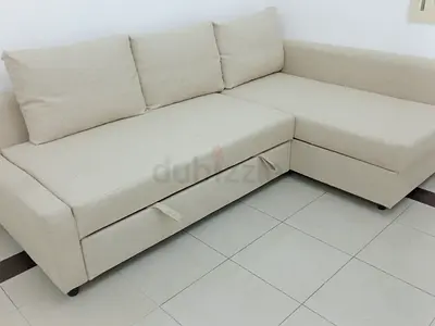 Beige L-shaped fabric corner sofa bedwith under-seat storage