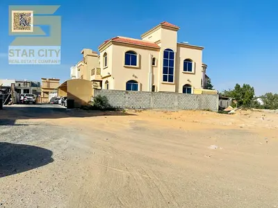 Golden Corner in Al-Yasmin: Large plot of land in a prime location, suitable for residential and investment purposes, at a negotiable price.