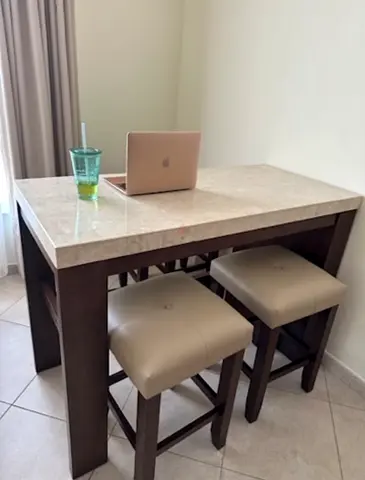 Kitchen island with marble top and 4 bar stools