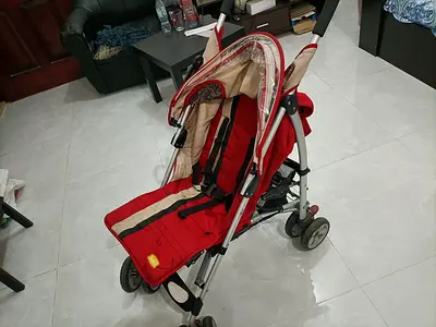 Red lightweight baby stroller - good condition