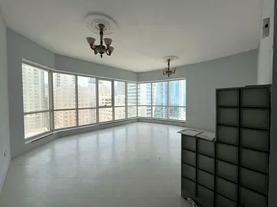 1BR full sea view in Al Majaz 3, Al Qasba. Free AC, parking, gym & pool. Large kitchen, built-in wardrobes.