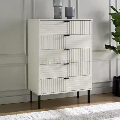 White ribbed tall 5-drawer dresser from Homecentre. Bought 1 year ago for AED 1000, 9/10 condition.
