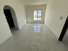 Two bedrooms and a living room, second tenant. Al Rashidiya 1. Sea view. New building. 40,000 AED in