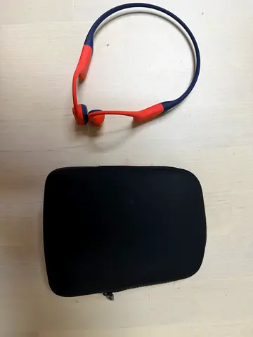Shokz bone-conduction headphones with carry case , like new