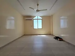 A two-bedroom apartment with a living room is available for annual rent in Al Rawda 3, Ajman. It boa