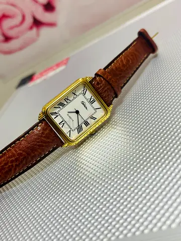 Classic rectangular gold-tone womens watch with brown leather strap