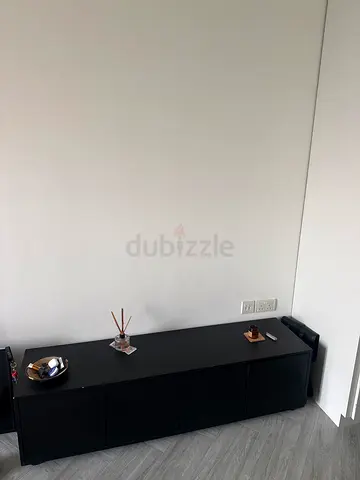 Black low TV cabinet / entertainment unit - good condition