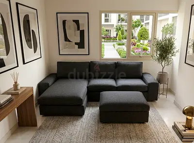 L-Shape Sofa Set – Stylish dark grey fabric with spacious seating, perfect for modern homes. Comes