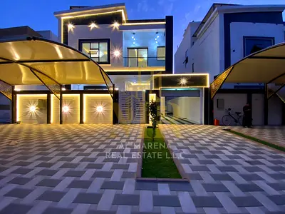 Villa for sale in Ajman | Al Helio 2 area | 6 bedrooms, majlis, 2 living rooms, roof terrace, and maid's room | Freehold for all nationalities | Price