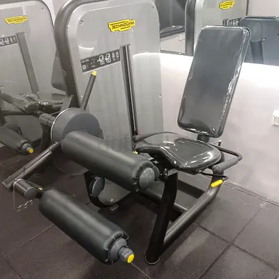 Technogym seated leg extension / leg curl machine - used, good condition