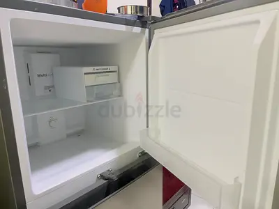 Compact double -door fridge with top freezer - new condition