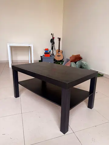 Dark rectangular coffee table with lower shelf - used