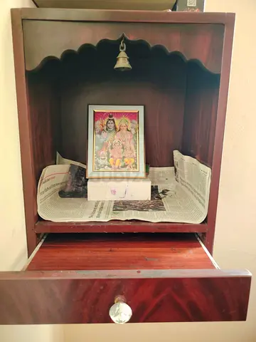 Wooden wall-mounted puja mandir / prayer cabinet with drawer