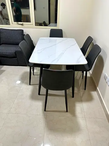 Premium-quality surface with a sleek white marble design that adds a luxury touch to your