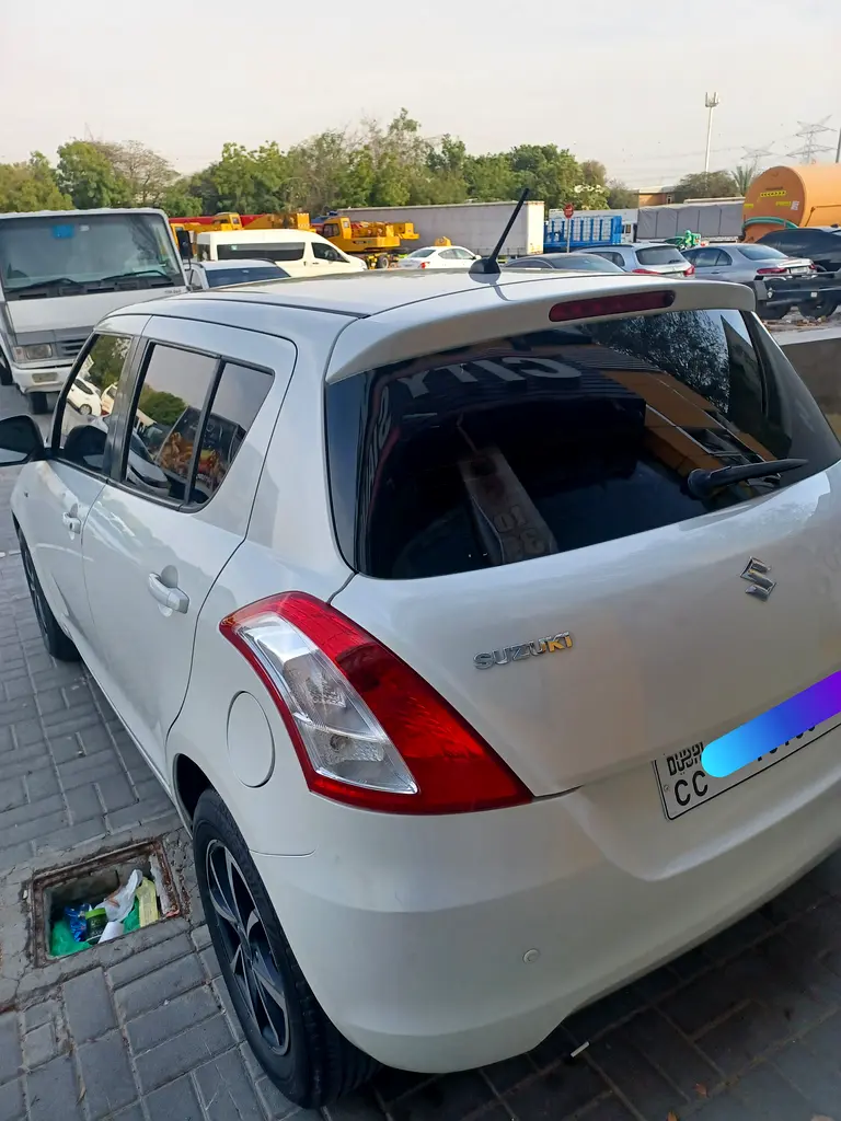 Suzuki Swift 2014 — photo 1 of 15