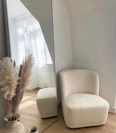 My cream bouclé accent chair — low-back lounge chair