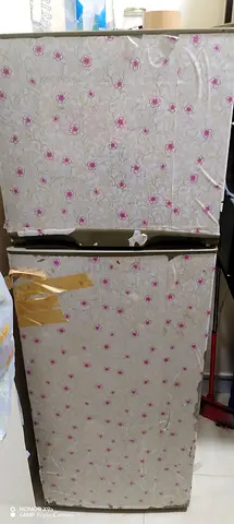 Small 2-door refrigerator (top freezer) - used, working