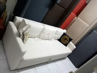 White 2-seater sofa -bed good condition