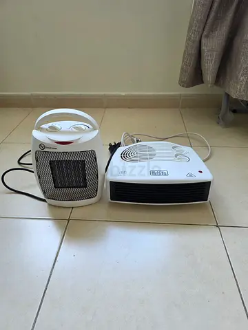 Two compact electric room heaters - used, working