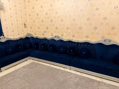 My navy blue velvet L-shaped majlis sofa - good condition