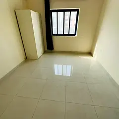 Two-bedroom apartment with a living room - Al Jurf 3, Ajman - near the Chinese market - central air