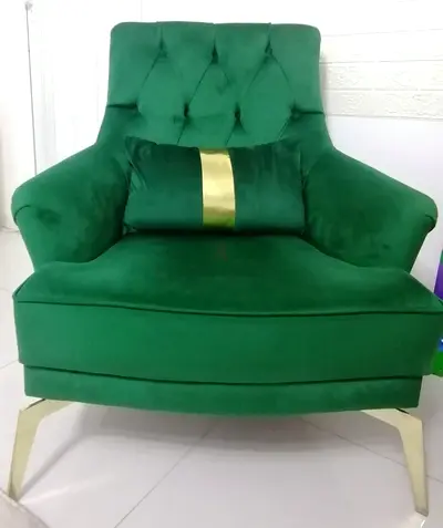 My emerald green velvet armchair, tufted back with gold legs